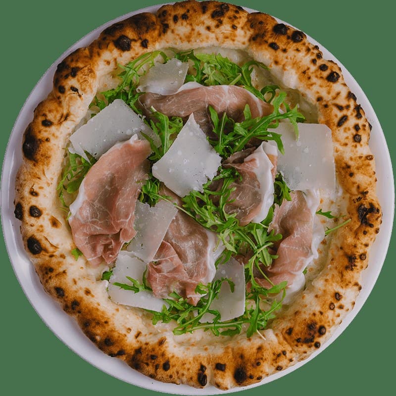 Pizza with a raised crust from Five Olives restaurant